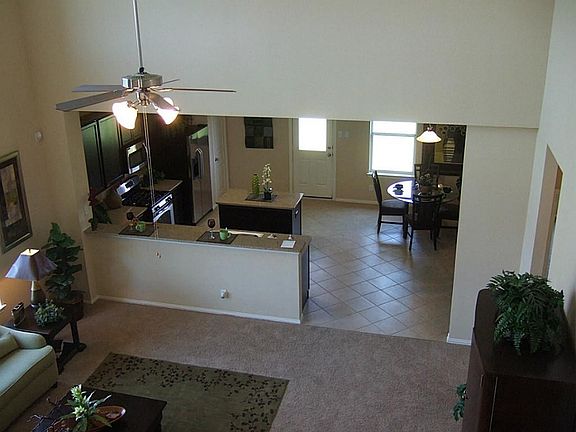 FAMILY ROOM VERY OPEN TO COUNTRY KITCHEN