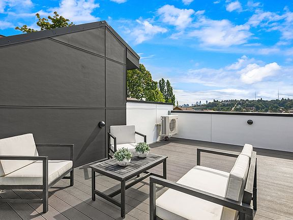 Rooftop deck covers full footprint of home and designed with privacy in mind. Each home offers a slightly different view of Queen Anne Hill, Fremont, Downtown, and the Cascades - one even has a view of Mt. Rainier.