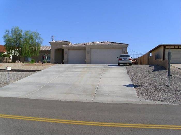 Front with 3-car garage