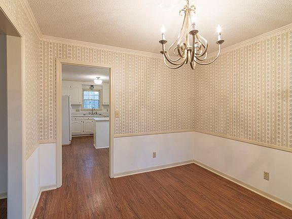 Dining room looking into kitchen.