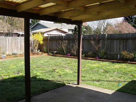 Large yard with covered patio 