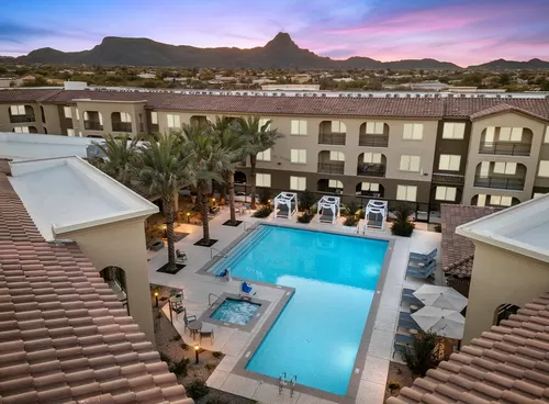 Resort Style Pool with Sunset - Album Marana - 55+ Active Adult Apartment Homes