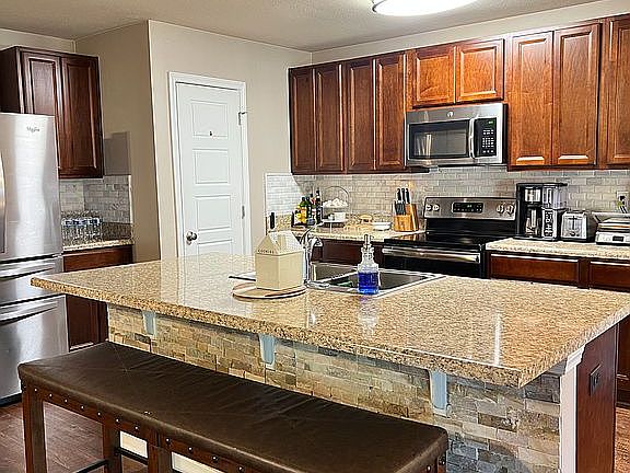 5th image of 10006 Summer Woods Cir N