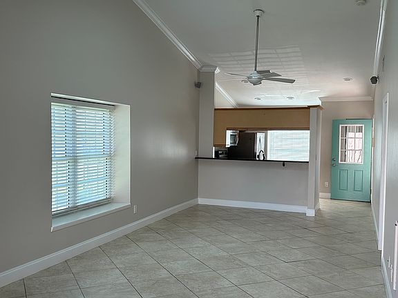 Open Living, Dining Area W/ Vaulted Ceilings