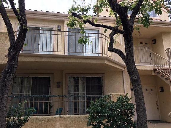 Top unit with balcony.