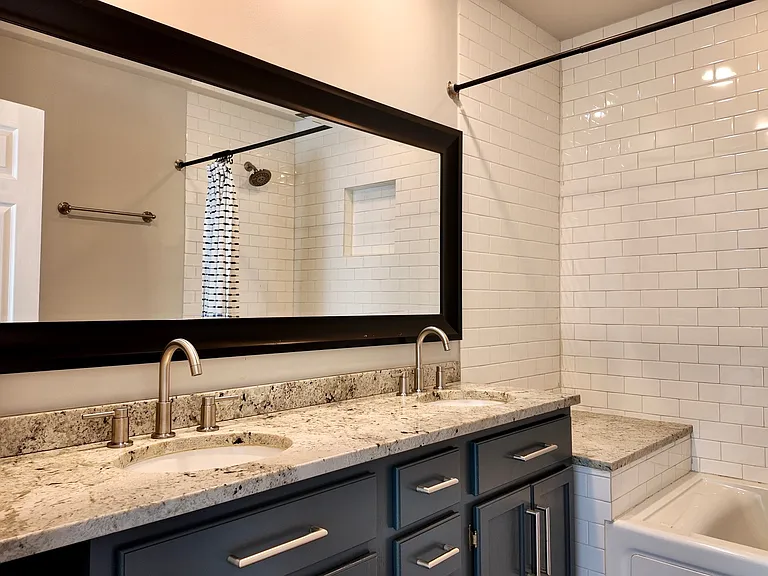 Granite matching countertops with guest bathroom and kitchen