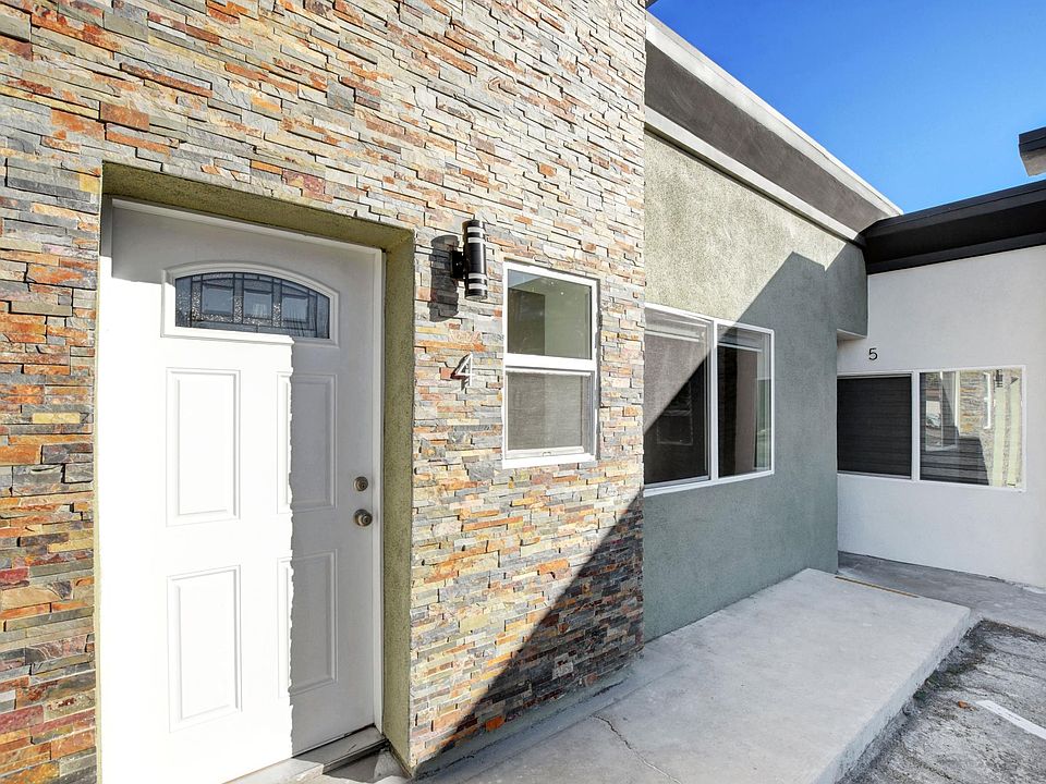 Sunny apartment -- with parking allocated right in front of the entry door.