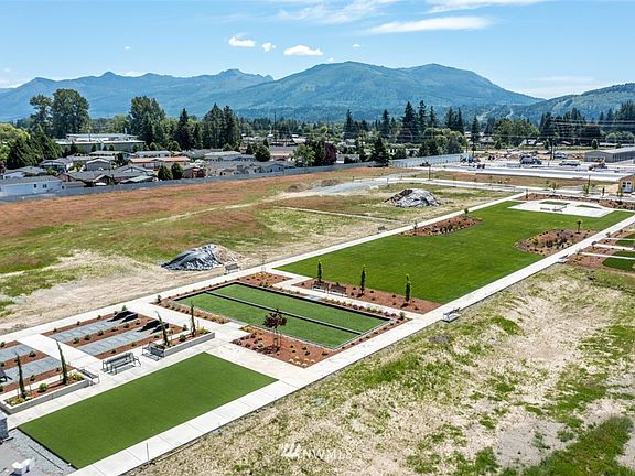 One acre park with a walking trail around it.