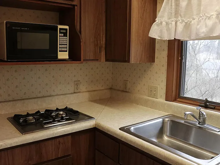 Second floor kitchen (refrigerator is to the right of the sink)