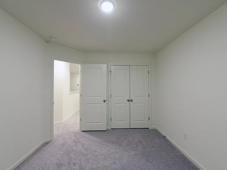 Bedroom 1 - reach in closet. Carpet replaced with LVP