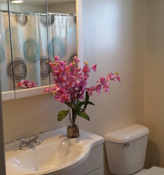 Full bathroom located on upper floor.