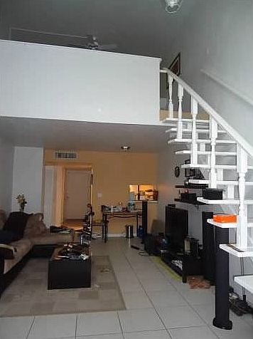 Stairs leading to bedroom