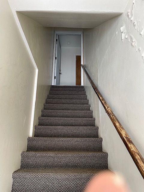 The rest of the apartment is located at the top of this privately accessed stairway.