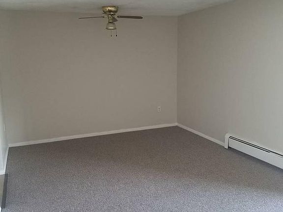 PHOTOS OF UNIT PRIOR TO CURRENT TENANT