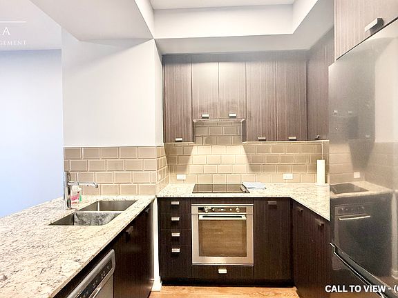 2nd image of 255 Village Green Sq #204