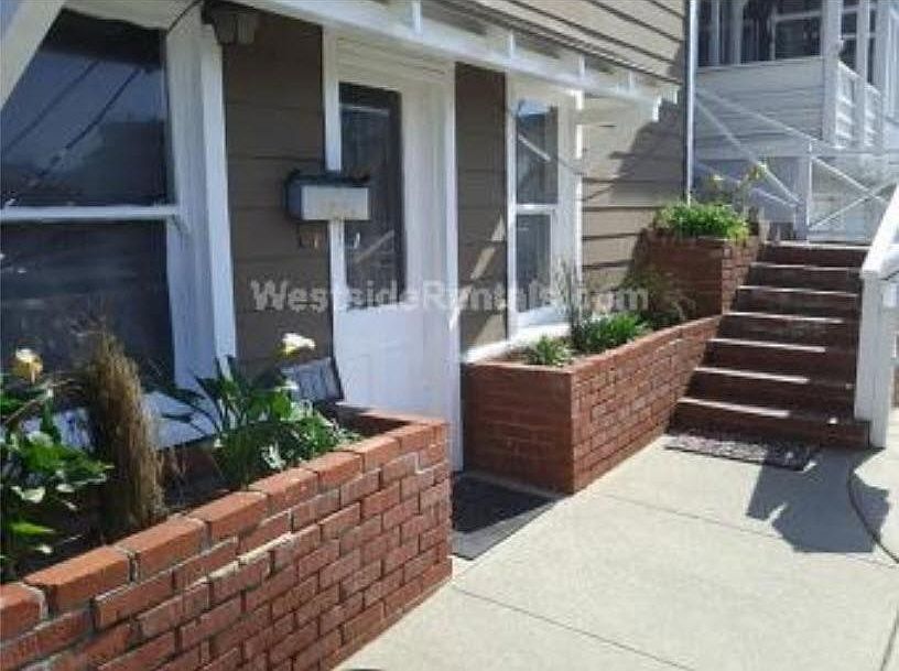 Partial view of front of studio and its deck. See updated photos with new paint on the building - a beautiful nautical blue!