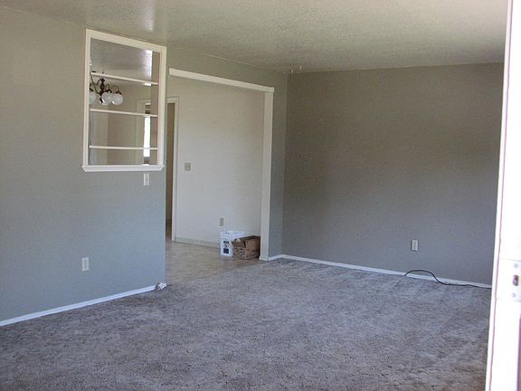 Living room that goes into the dining room & kitchen