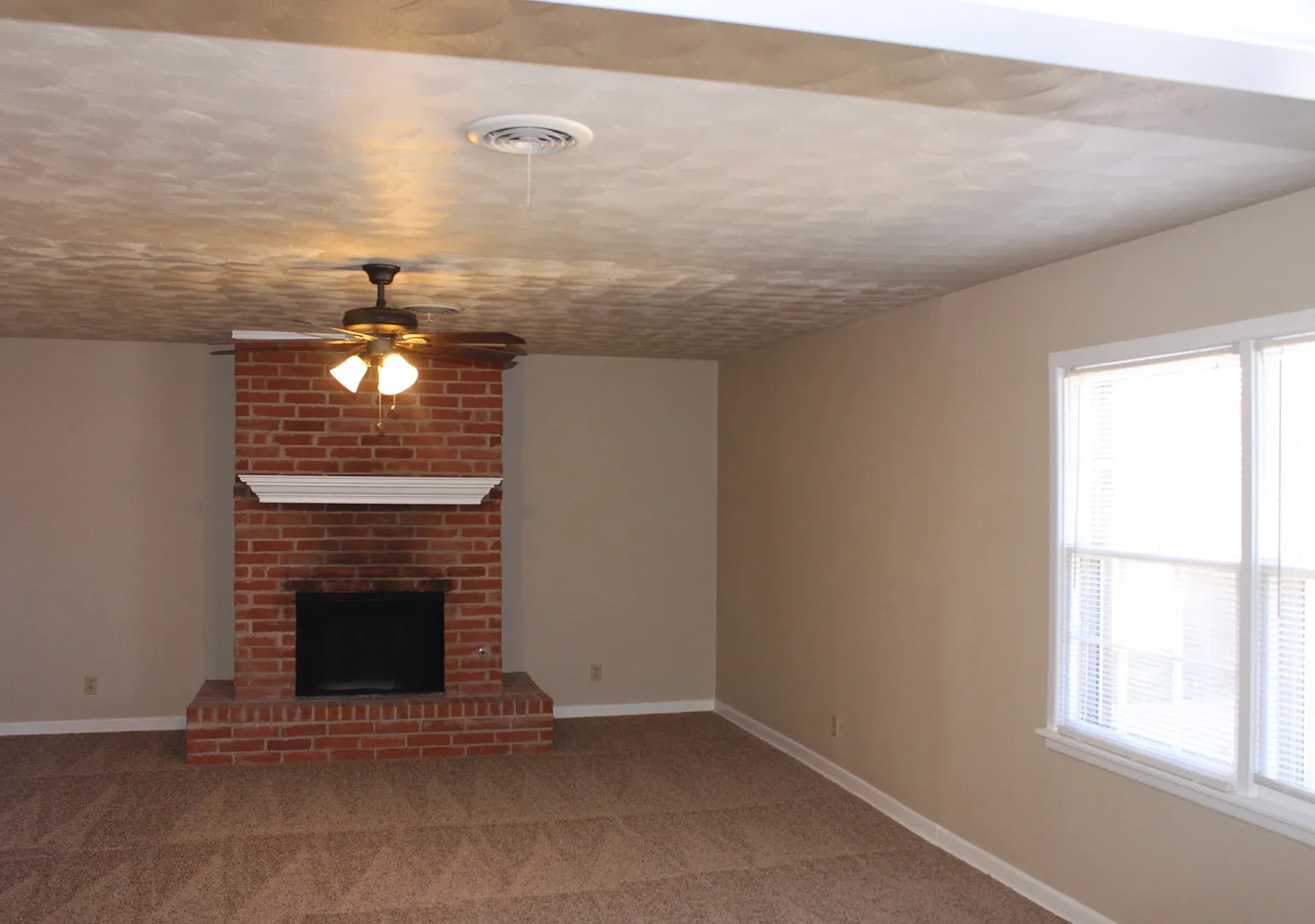 Updated 3-Bedroom Home with Carport and Storage Building — Photo 4