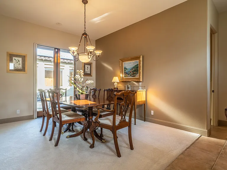 Dining room looks onto front patio area and is perfect for holiday gatherings.