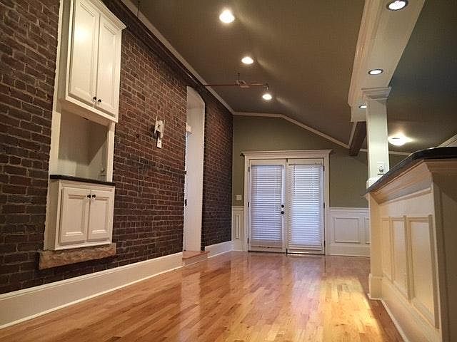 Spacious Living Room with Hardwood Flooring