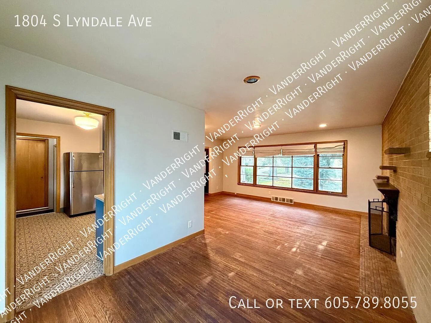 Charming 3-Bedroom Home with Hardwood Floors, Fenced Yard & Garage — Photo 3