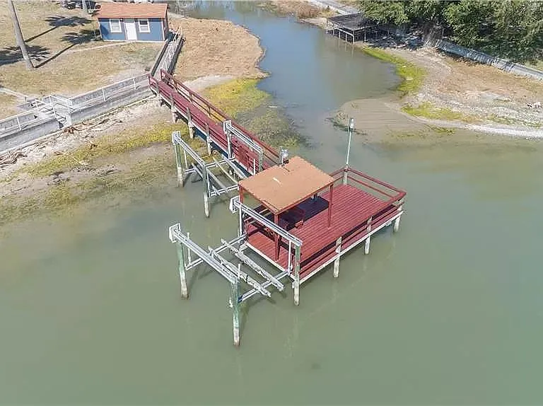 Covered Dock, jet ski, and boat lifts