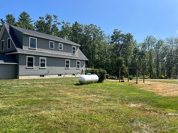 Side of house with clothes line