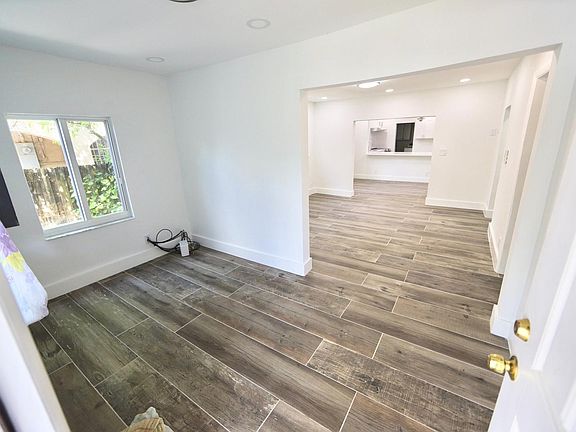 Reception area, living room, dining room, and Kitchen.