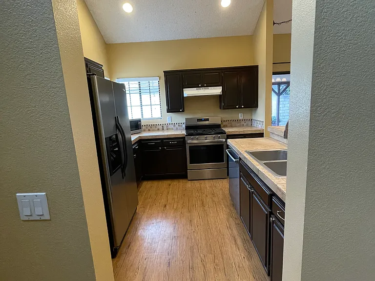 Kitchen with Open Concept Living to the Living Room