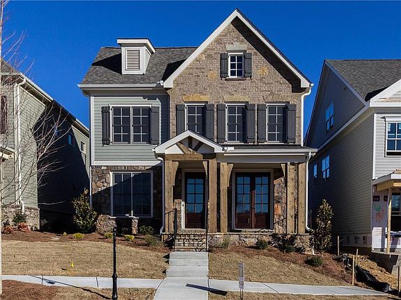 The Kentmere D on lot 583 will have a full brick front elevation. Not actual home. Photos of a previ