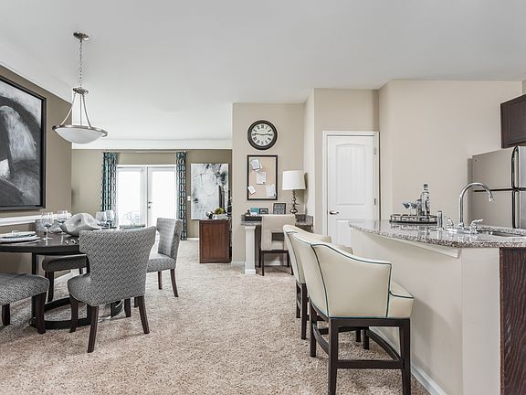 Open Kitchen with Breakfast Bar and Living Room