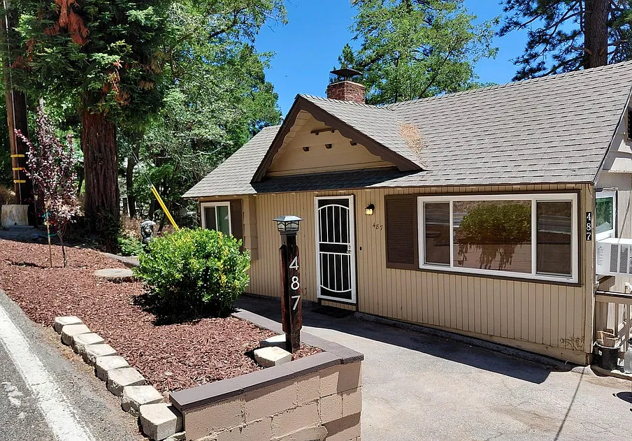 Charming mountain cottage with updated landscaping and private entrance.