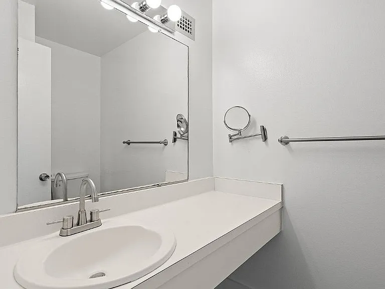 Half-bath off primary bedroom