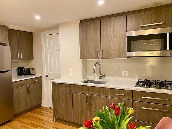 Appliances include combination Bosch microwave and convection oven.