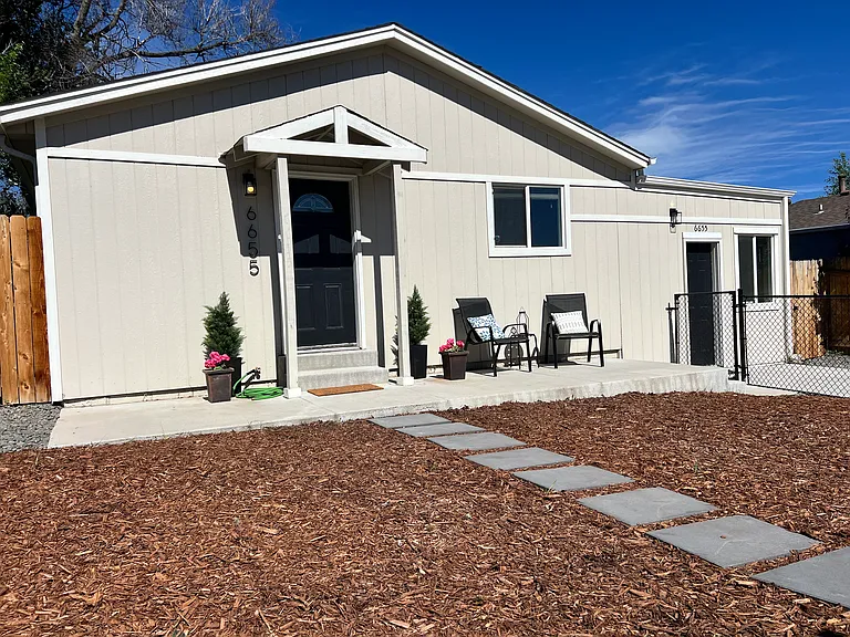 Welcome Home: Modern curb appeal meets zero-maintenance xeriscaped front yard_ no weekend lawn mowing required!"