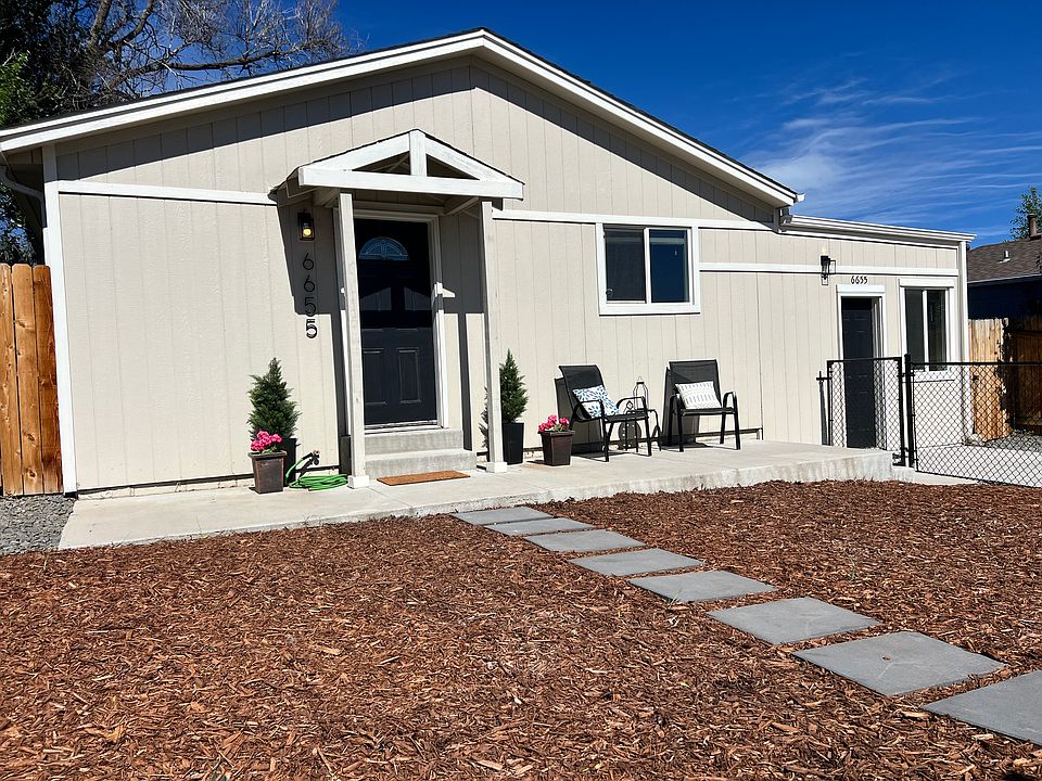 Welcome Home: Modern curb appeal meets zero-maintenance xeriscaped front yard_ no weekend lawn mowing required!"