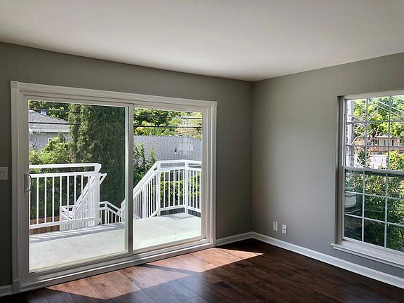 Private entrance into the second bedroom via sliding door to back patio.
