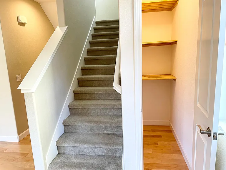 storage closet on main level and stairs to bedrooms