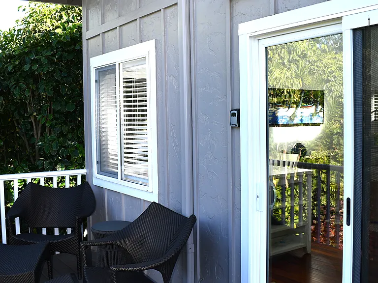 Enter off of the deck through sliding glass doors.
