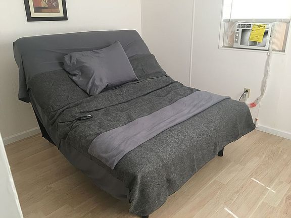 Queen beds fit both bedrooms