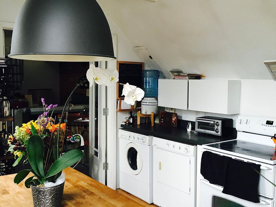 Large Kitchen, opens to deck. New refrigerator and washer, double oven, microwave.