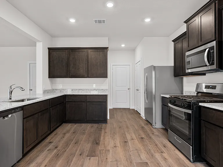 The kitchen has energy efficient appliances.