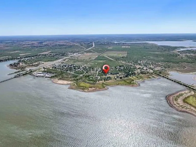 Drone view of property location East toward West