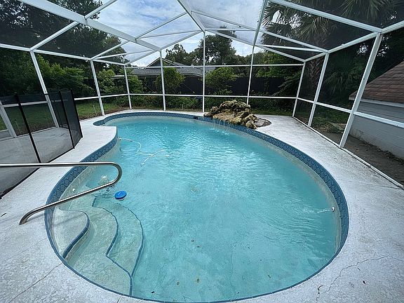 Pool area with water feature