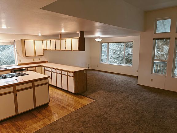 From the front entry looking toward the kitchen and dining area.