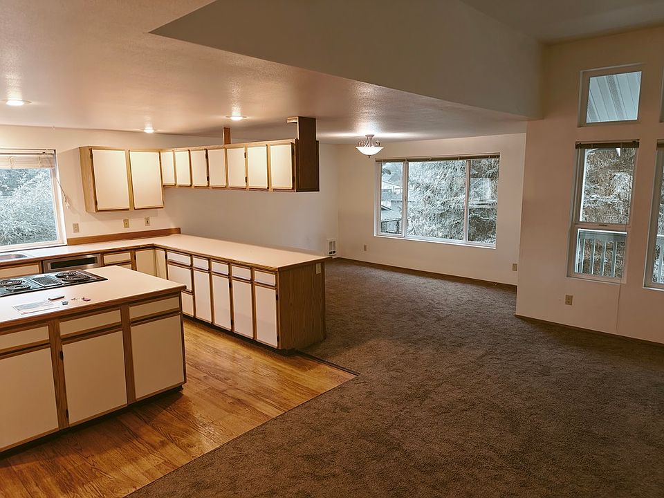 From the front entry looking toward the kitchen and dining area.