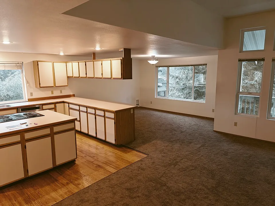 From the front entry looking toward the kitchen and dining area.