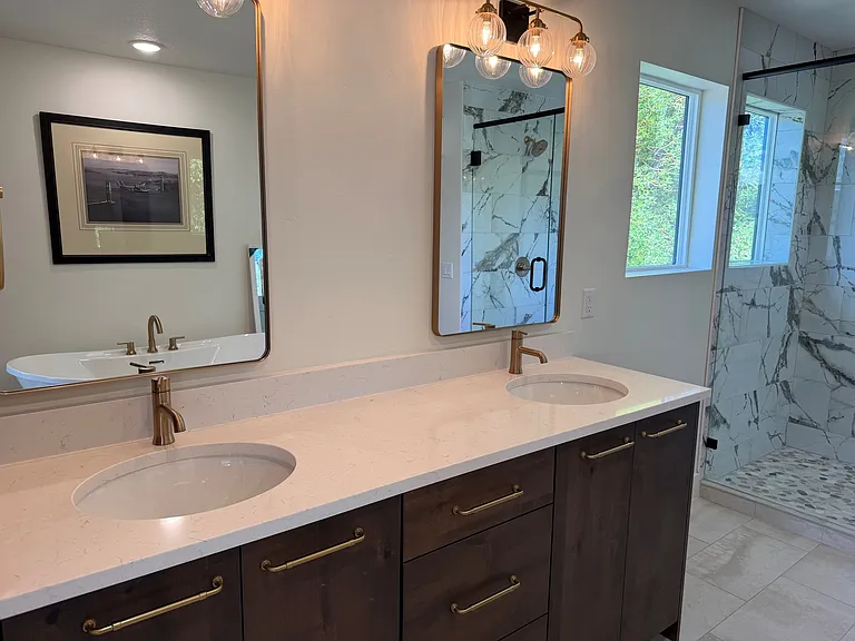 Large master bathroom with walk-in shower, double vanity, and beautiful soaking tub