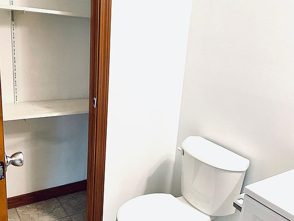 Bathroom with large storage closet