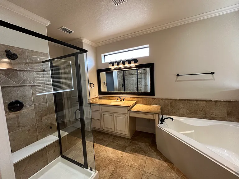 Master bathroom with designer cabinets
